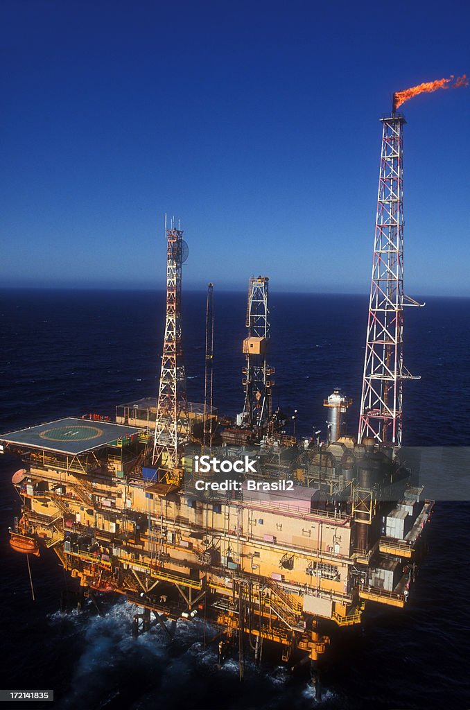 Oil rig Aerial view from an helicopter of one oil platform in the atlantic ocean Fuel and Power Generation Stock Photo