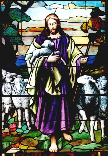 This stained glass of Jesus as the Good Shepherd is a little unusual because the maker gave him 6 toes on each foot. The old time glass makers sometimes did unusual things like this to mark their work. Methodist Church in Walters, OK.