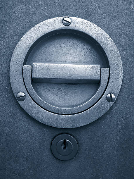 Close-up of round metallic handle and lock stock photo