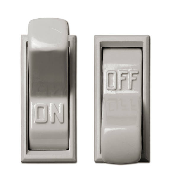 Lightswitches Lightswitches in the on and off positions light switch stock pictures, royalty-free photos & images