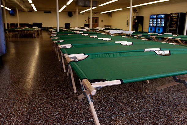 Flood-NJ shelter cots A Red Cross shelter set up for temporary shelter emergency shelter photos stock pictures, royalty-free photos & images