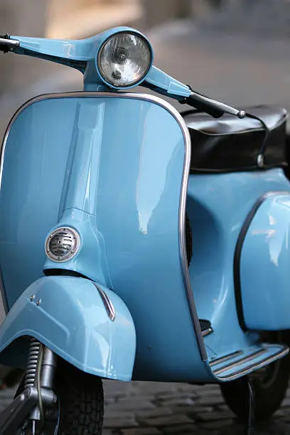 Photo of Blue Italian vintage scooter in Rome, Italy