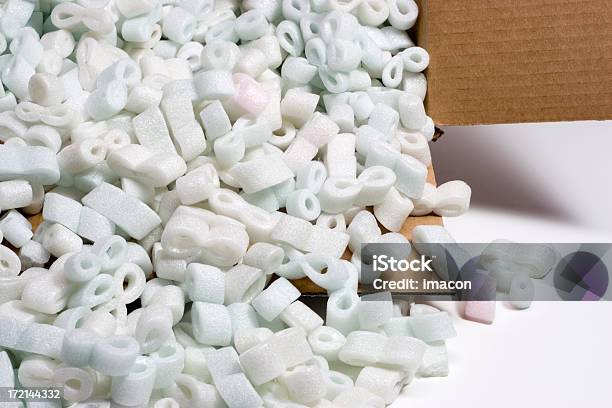Shipping Box And Styrofoam Peanuts Stock Photo - Download Image Now - Cut Out, Falling, Packing