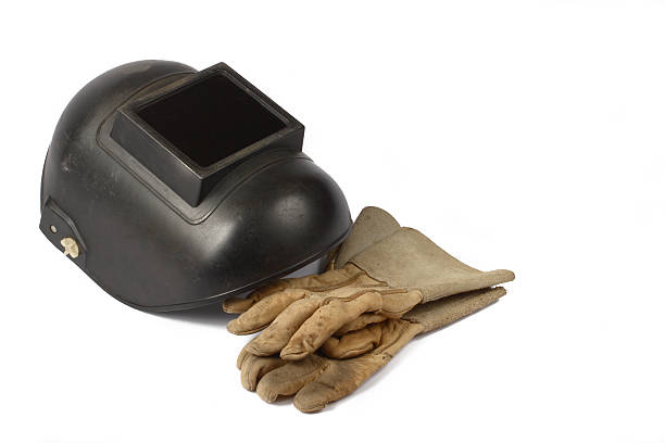 сварщик's маска и перчатки - glove leather black isolated стоковые фото и изображения