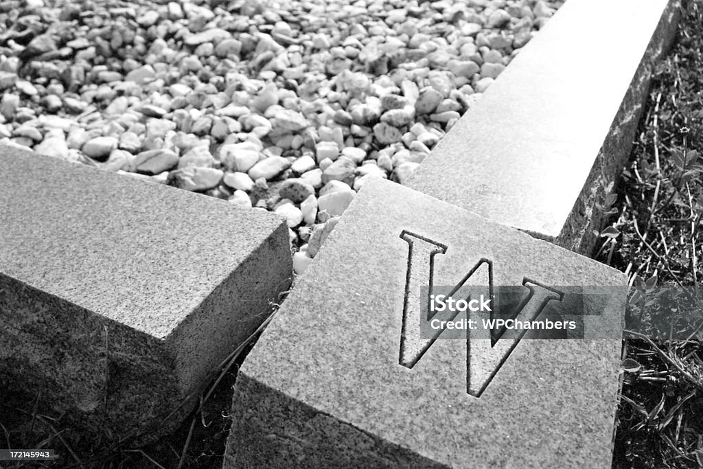 W Cornerstone Corner of a grave. Abstract Stock Photo