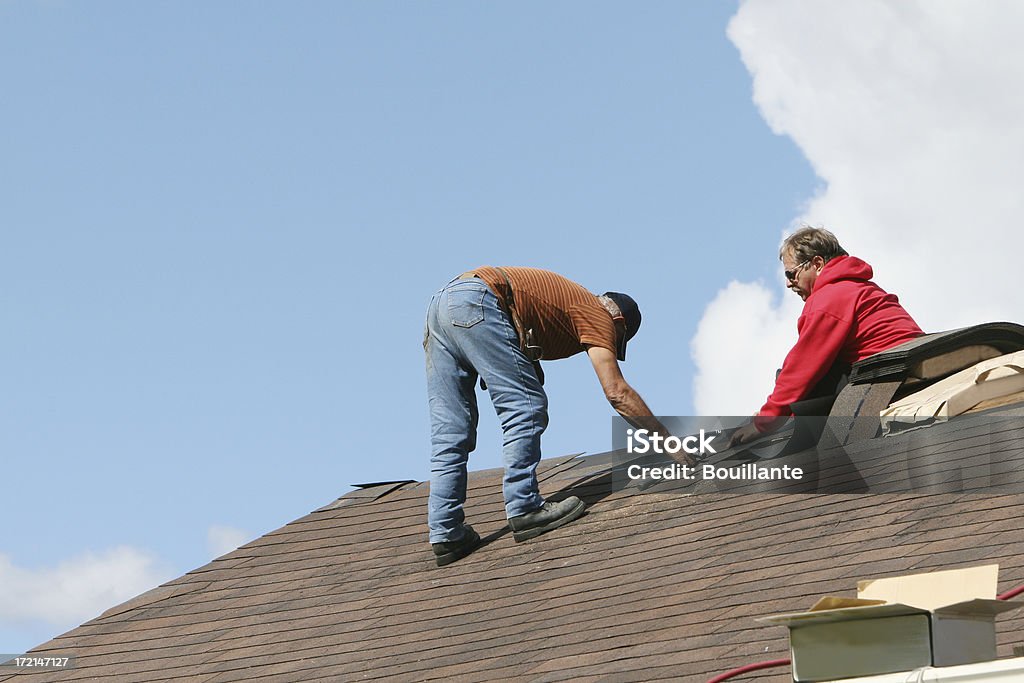 Punte per volta al lavoro - Foto stock royalty-free di Tetto