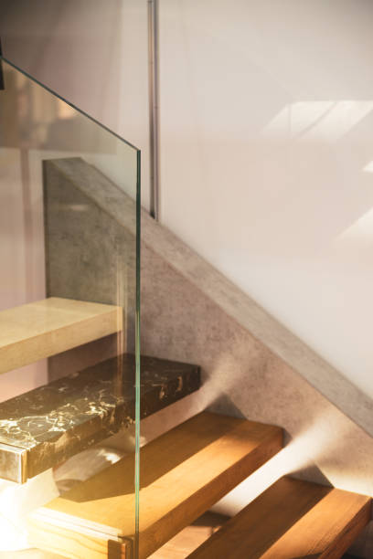 istock Staircase with clear glass railings 1721476785