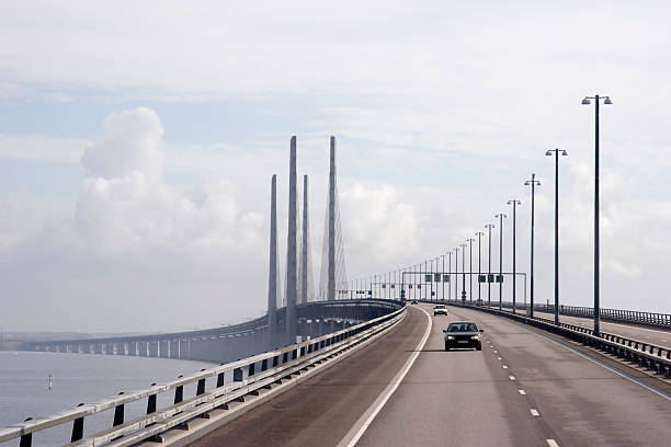 Oresund Bridge between Sweden and Denmark Linking Malmo in Sweden with Copenhagen in Denmark oresund bridge stock pictures, royalty-free photos & images