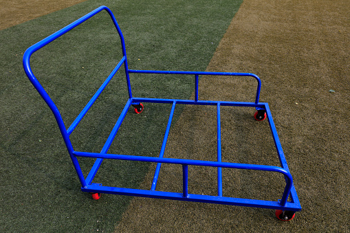 Sports equipment on the green plastic playground