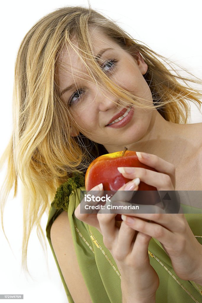 Eve with an apple A pretty girl with an apple. 16-17 Years Stock Photo