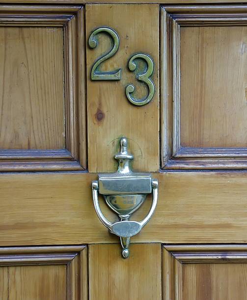 istock number 23 on a door with knocker 172150774