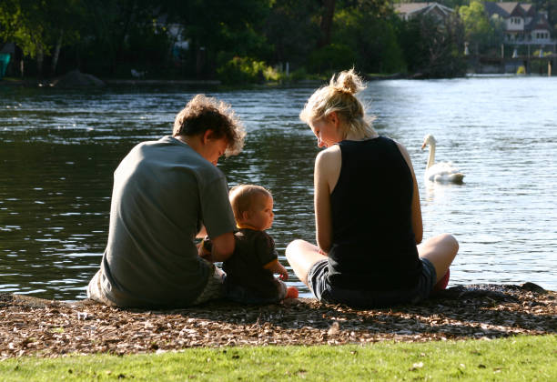 istock Happy family near river. 172151515