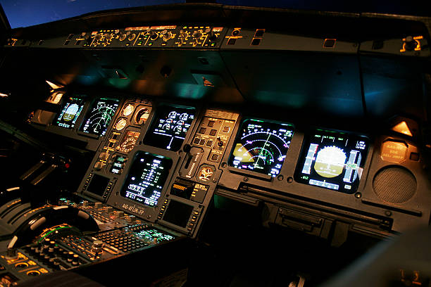 flugdeck der fluggesellschaft - airplane cockpit taking off pilot stock-fotos und bilder