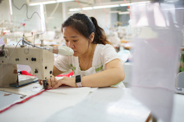 istock Factory women's clothing lathe 1721518451