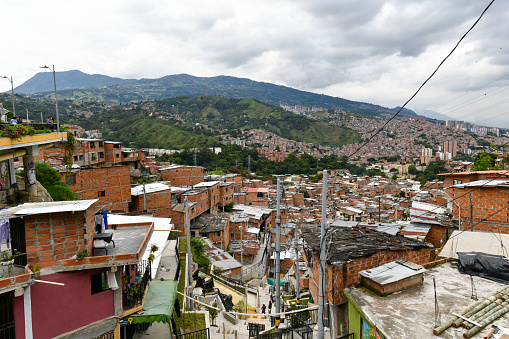 Colorful streets of Comuna 13 district in Medellin, Colombia, a former crime ridden neighborhood.