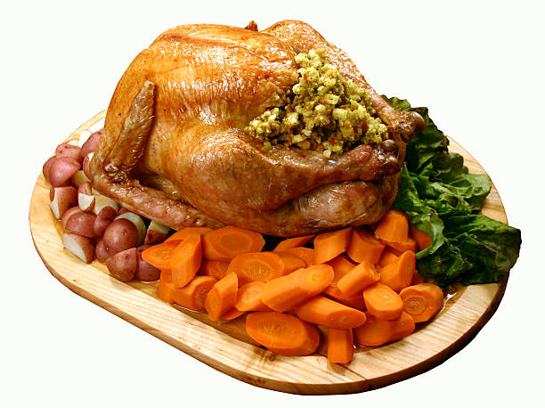 Holiday Dinner Turkey dinner with carrots, potatoes and stuffing. thanksgiving full stock pictures, royalty-free photos & images