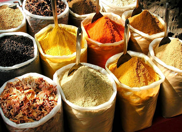 spice market "A spice vendor's display at a local market in south india: colorful, powdered spices in large sacks" chennai photos stock pictures, royalty-free photos & images