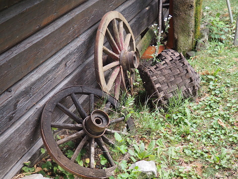 A wheel is a mover, a disk that rotates freely or is fixed on a rotating axle, allowing the body placed on it to roll rather than slide. Wooden wheel from a chariot or wagon, ethno village Stanisici.