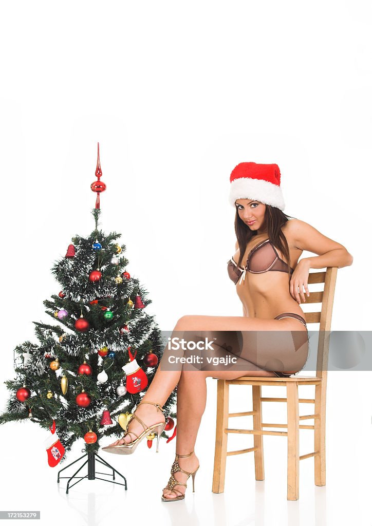 Sexy ragazza vicino albero di Natale - Foto stock royalty-free di Albero di natale