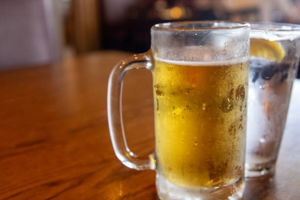 istock Mug of beer and water 1721533103