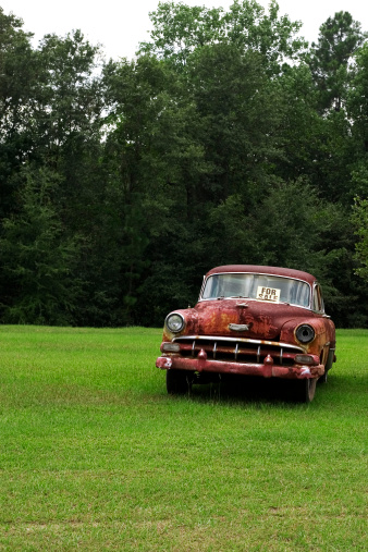 An old, extremely rusty, Chevrolet Bel-Air car, discovered sitting in a field next to a farmhouse with a For Sale notice on it. If I had the time, the money and the inclination I would have loved to buy it and restore it, but I don't so I didn't so there. :)