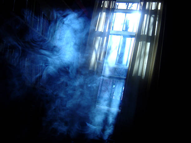 Creepy shot of a smoky room at night stock photo