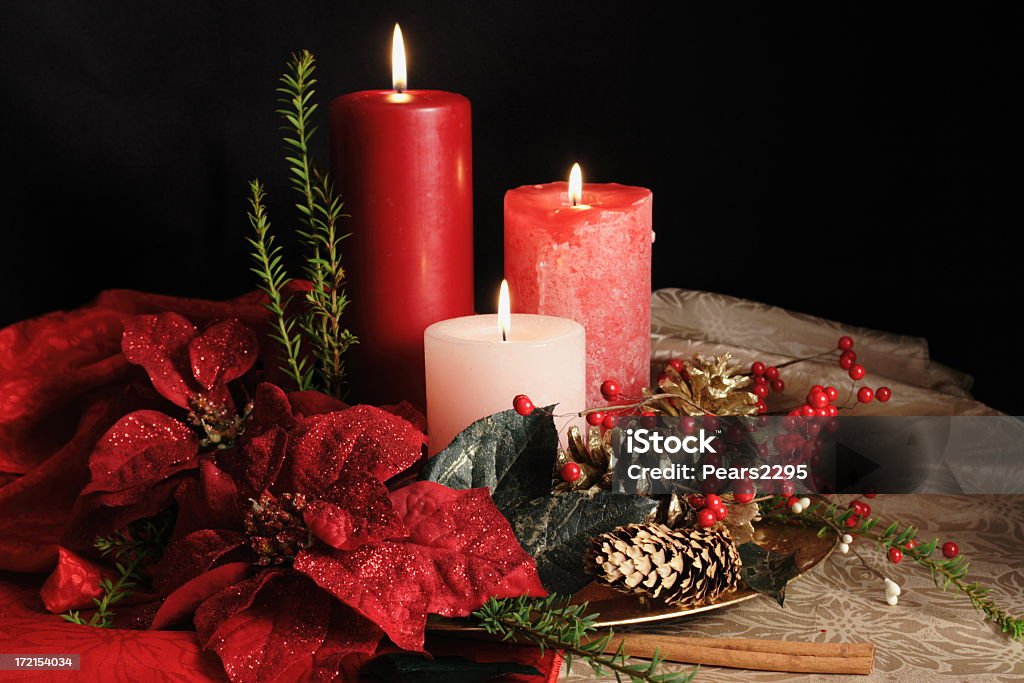 Navidad velas - Foto de stock de Flor de Pascua libre de derechos