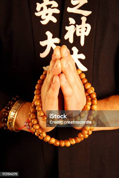 Buddhist Monk Praying Stock Photo - Download Image Now - Bead, Buddhism, Color Image