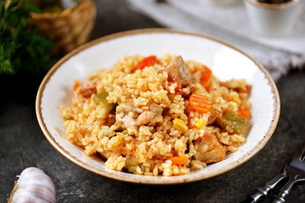 istock Rice pilaf with chicken and vegetables 1721543186