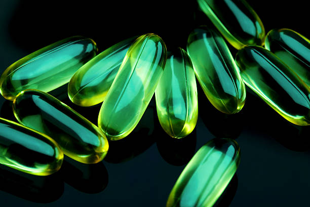 cachets - nutritional supplement capsule gel effect gelatin photos et images de collection
