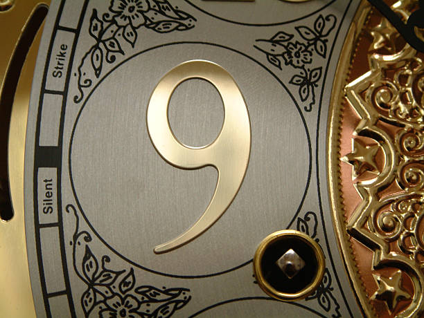 istock Number nine made of metal on clock 172155567