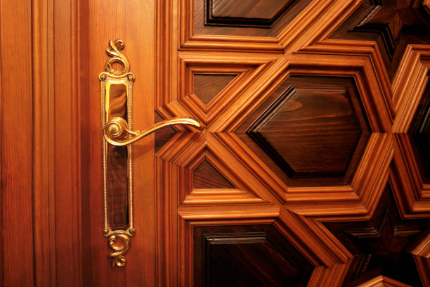 Golden handle on an elegant door