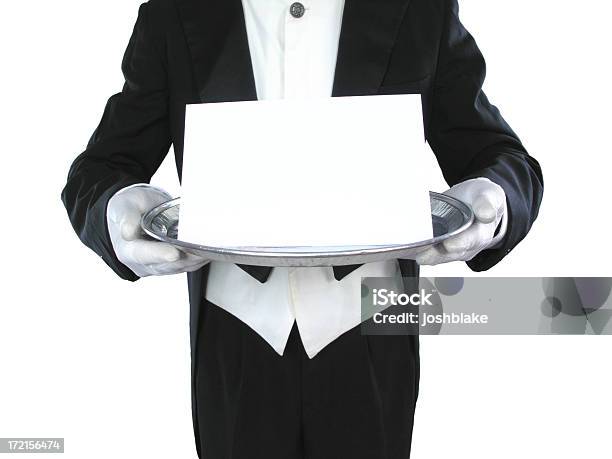 Black And White Image Of A Butler Holding A Blank Paper Stock Photo - Download Image Now