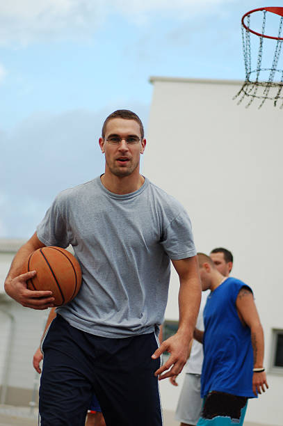 istock basketball player looking straight into the camera 172156648