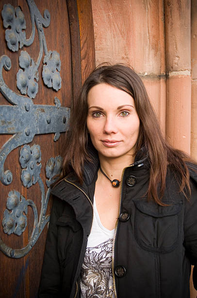 istock Young woman and door 172157004