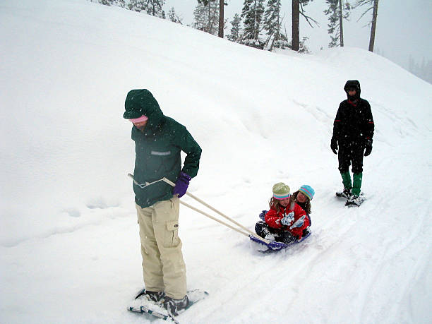 istock Family Snowshoeing 172157074