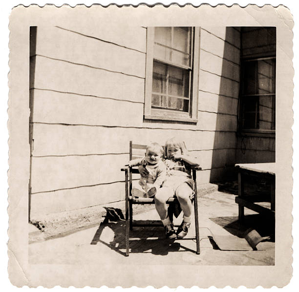 istock Two kids in rocker with edges. 172157185