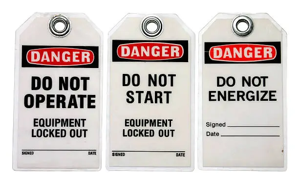 Photo of Three danger lockout tags about equipment