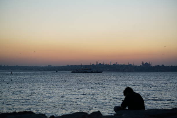 Sunset with sun behind silhouette in Istanbul