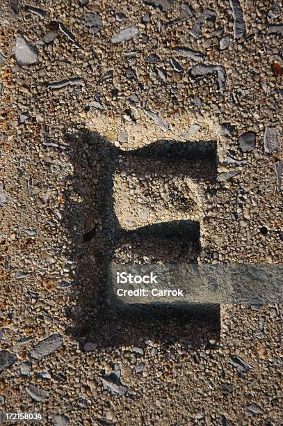 The Letter E Stock Photo - Download Image Now - Alphabet, Cement, Closed