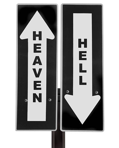 Heaven or Hell roadsign stock photo