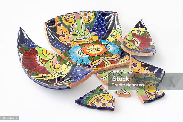 A Brightly Painted Bowl In Shards On A White Background Stock Photo - Download Image Now