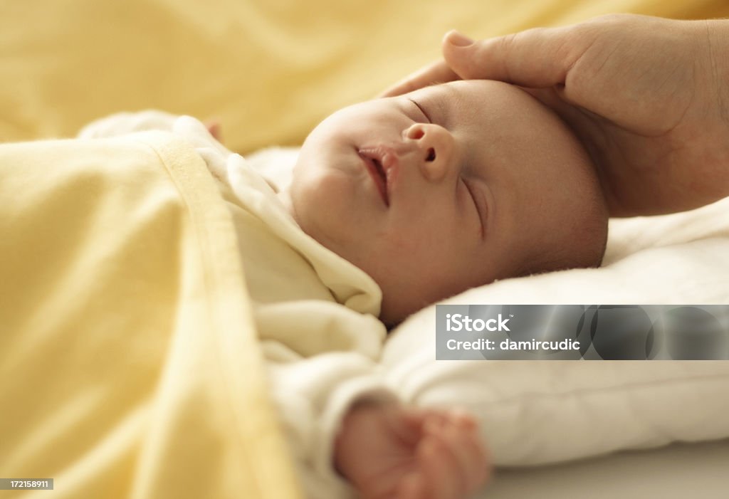 Newborn baby sleeping with mother's hand my newborn daughter Sara, 15 days old only Baby - Human Age Stock Photo