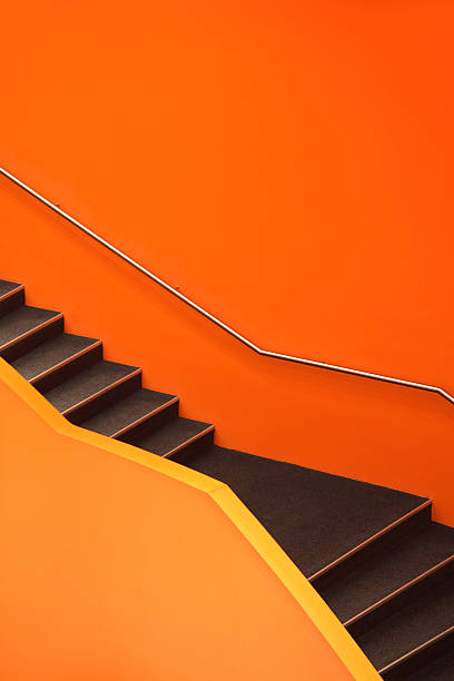 escaleras, abstract orange escalera - architecture bright vibrant color brilliant fotografías e imágenes de stock