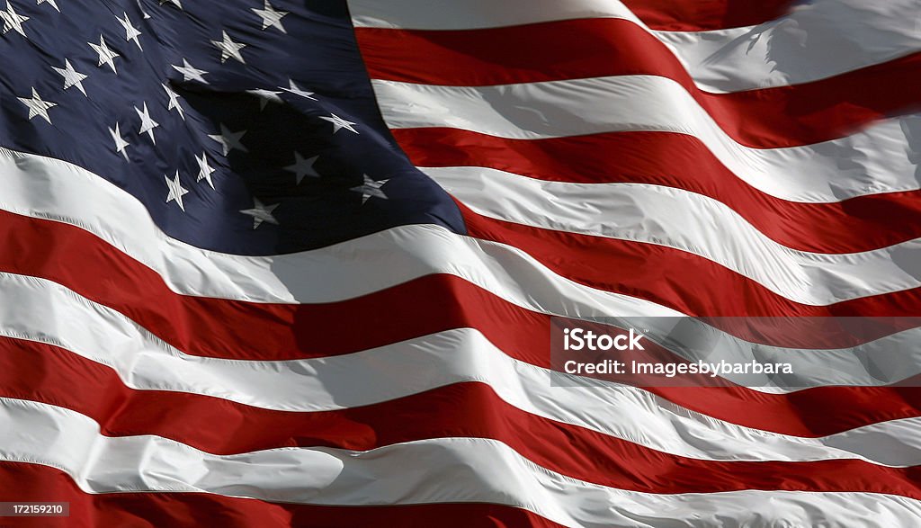 United States of America Flag. American flag in the wind. See one more angle of this image.please view other similar images. American Flag Stock Photo
