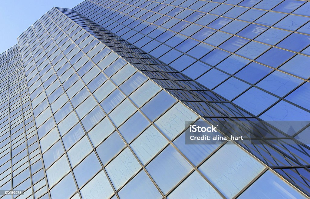 blue windows from a office building blue office windows...blue building Blue Stock Photo