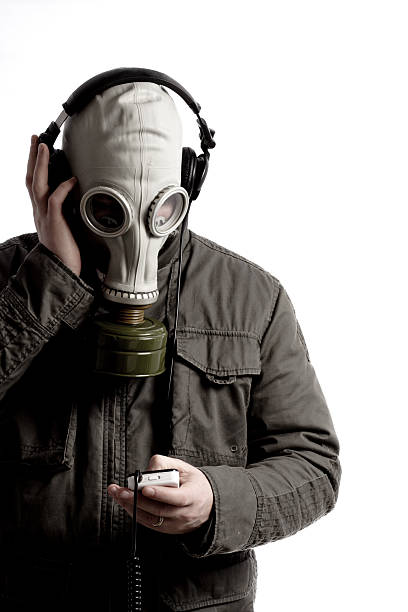 istock Mp3 listener with gas mask 172159282