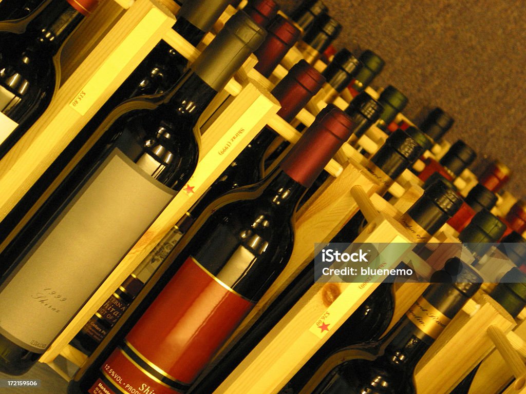 Rack Brandless bottle of wine on rack.See also Bottle Stock Photo