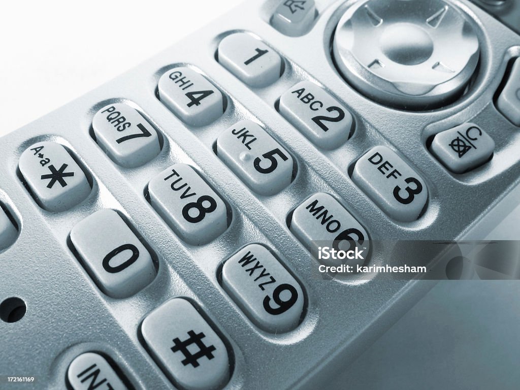 Close-up photo of the numbers on a cordless phone Phone pad Communication Stock Photo