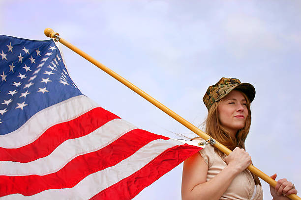 istock Young Woman with American Flag 172161680